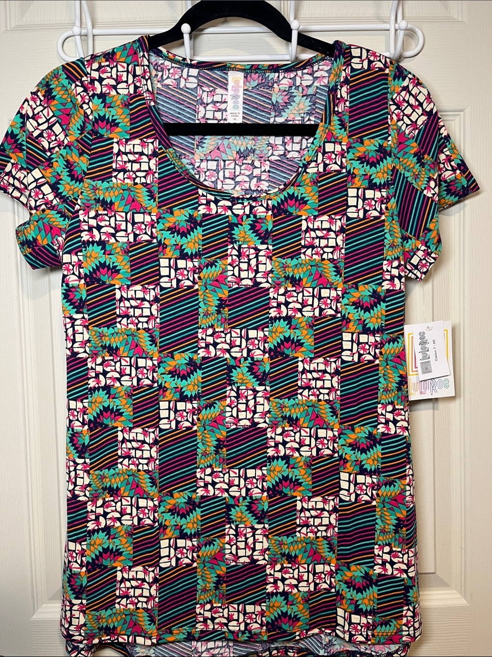 LuLaRoe Multicolor Geometric Floral Scoop Neck Short Sleeve Top
